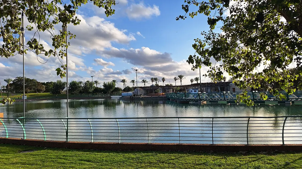 The lake in Ra'anana Park in the afternoon, where the park boat sails